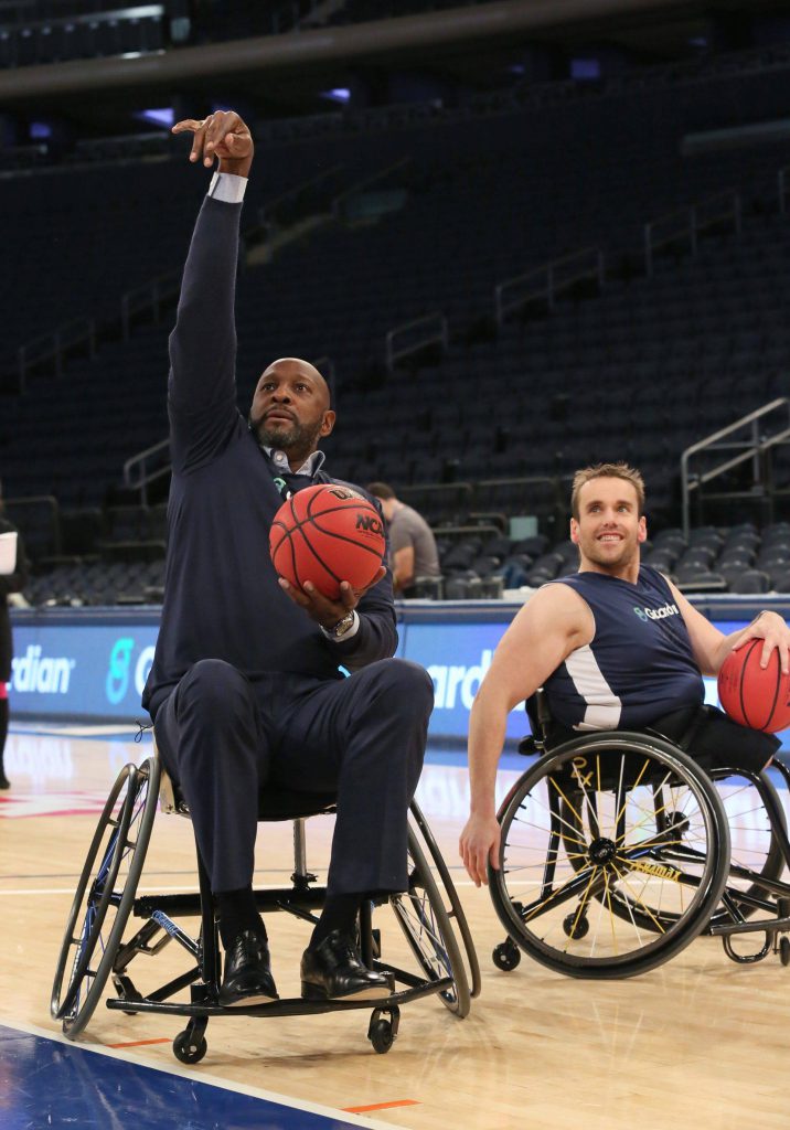 Guardian Life H-O-R-S-E Game at Madison Square Garden with Alonzo Mourning Demonstrated that Disability is Not Inability | CJsGo CJsGo | Basketball Hall of Famer Alonzo Mourning played on center court on Nov. 21 with wheelchair hoop star Chris Saint-Remy during Georgetown-Texas half-time.
